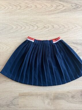 Girls Navy Pleated Skirt with Red-Trim Waistband